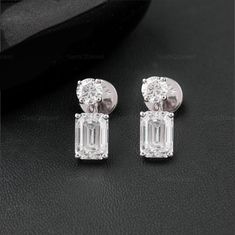 Moissanite Diamond Stud Earrings, Two Stone Dangle Drop Push Back Earrings, Emerald And Round Diamond Teardrop Stud Earrings For Women, Moissanite Diamond Earrings, Anniversary Gift For Women ▶Center Stone Details: Diamond Type: Moissanite Diamond Shape: Emerald cut Diamond Color: (colorless) Diamond Clarity: VVS Diamond Dimension: 5*7 MM Approx. Diamond Weight: 1 CT each Approx. ▶Center Stone Details: Diamond Type: Moissanite Diamond Shape: Round cut Diamond Color: (colorless) Diamond Clarity: VVS Diamond Dimension: 4 MM Approx. Diamond Weight: 0.30 CT each Approx. Can Be Done Sterling Silver, 10/14/18k Yellow gold/ Rose Gold/White gold. Why buy Moissanite over Diamond? ● Moissanite is pocket-friendly, it is almost 1/10 of the diamond price. ● Moissanite is Conflict-free and eco-friendly, Earrings Emerald, Vvs Diamond, Emerald Cut Rings, Colorless Diamond, Festival Jewelry, Jewelry Images, Stud Earrings For Women, Diamond Stud Earrings, Diamond Stud