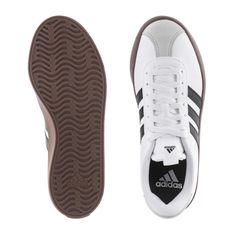 Some classic looks only get better with age, like the adidas VL Court 3.0 Women's Sneakers. They have a vulcanized rubber outsole, which blends in well at the skate park, but they look good anywhere you go. The light cushioning ensures for many skate days or walks without foot pain! Sneakers. adidas-branded. Lightweight, cushioned footbed. Vulcanized outsole. Adidas Low-top Skate Shoes For Light Sports, Classic White Adidas Skate Shoes, White Adidas Skate Shoes With Synthetic Material, Adidas White Slip-on Skate Shoes, Adidas Vl Court 3.0, Adidas Vl Court, Sell Shoes, Soccer Shop, Adidas Brand