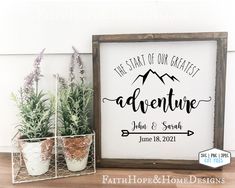 the start of our greatest adventure sign is displayed next to two potted plants on a shelf