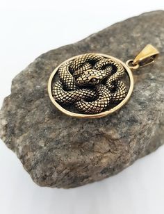 This item is made to order. Casting in any metal will take 14-19 days. Please, leave your orders.Astonishing snake pendant, unisex. Bronze or silver, with or without leather cord.Size - 1 inches / 2,6 cmWeight for bronze -  5,8 g.Weight for silver -  7,1 g.✤ If you have any questions - feel free to ask! Vampire Ring, Gothic Engagement Ring, Skull Engagement Ring, Necklace Snake, Wolf Necklace, Snake Pendant, Viking Necklace, Snake Jewelry, Snake Necklace