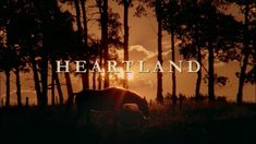 the words heartland are shown in front of an image of some trees and grass