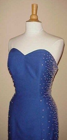 a blue dress on a mannequin dummy