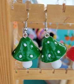 All earrings are allergy friendly.  These hanging earrings measure about .5 inches. Whimsical Green Hypoallergenic Earrings, Adjustable Whimsical Drop Earrings, Whimsical Adjustable Drop Earrings, White Dangle Earrings With Mushroom Design, Adjustable Green Drop Plug Earrings, Green Novelty Dangle Earrings, Whimsical Dangle Earrings With Mushroom Design, Green Dangle Earrings With Fun Style, Cute Green Earrings With Ear Wire