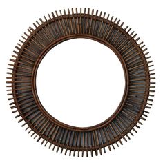 a round mirror that is made out of wood