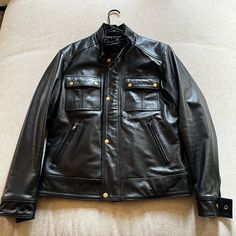 Size Medium In New Condition Never Worn Out Of Home. Classic Biker Jacket For Outdoor, Black Cafe Racer Leather Jacket For Streetwear, Black Leather Cafe Racer Outerwear, Black Cafe Racer Biker Jacket, Classic Black Leather Motorcycle Jacket, Classic Biker Jacket With Pockets For Biker Events, Black Biker Jacket With Pockets, Black Cafe Racer Jacket For Motorcycling, Black Cafe Racer Motorcycle Jacket