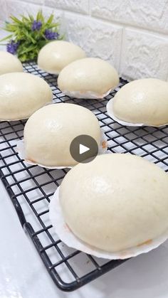 several buns sitting on top of a cooling rack