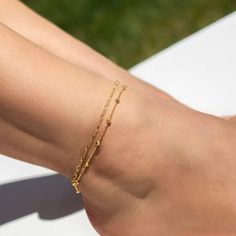 "18K Gold Filled Beaded Chain Anklet | Gold Chain Anklet | WATERPROOF Chain Anklet | Figaro Chain Anklet | Gold Anklet For Women * If you would like to add a Necklace or a Bracelet please follow the link below. **Anklet Materials: High-Quality 18K Gold Filled **Anklet Length: 9\" + 2\" adjustable * All anklets are nickel-free, lead-free, waterproof and tarnish resistant. Our jewelry is made to last, made of high-quality materials and it will NOT tarnish nor discolor. This item is hypoallergenic Beaded Bracelet Anklet As Gift, Dainty Gold Ankle Wrap Bracelets, Gold Anklets With Tiny Beads As Gift, Gold Beads Anklets As Gift, Adjustable Beaded Chain Anklet As Gift, Dainty Beaded Chain Anklets With Round Beads, Gold Dainty Ankle Bracelet, Ankle Wrap Anklets With Tiny Beads For Gifts, Gold Anklets With Satellite Chain As Gift