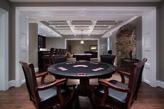 a casino table with chairs around it