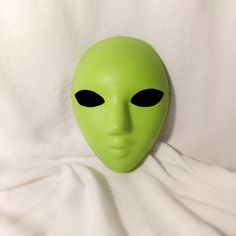 Lime green alien mask with black eye screens. It is made from a paper mache pulp blank mask. Eye screens are designed and installed in my shop. It is handpainted with interior wall paint so it holds better than your average artist acrylic paint.  Hypoallergenic cheek pads are installed to keep your nose away from the mask a tiny bit. This adds comfort and also breathing space.  Want to make it yourself? Blank masks are available here! https://www.etsy.com/shop/Bythecreekcreations?ref=seller-plat Alien Mask, Blank Mask, Green Alien, Party Mask, Paper Pulp, Interior Wall Paint, Mask Party, Interior Wall, Wall Paint