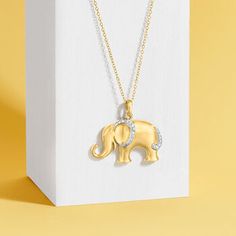 Ross-Simons - Gold Over Silver Elephant Pendant Necklace, Diamond Accent. 18". This sacred symbol is as adorable as it is meaningful. In 18kt yellow gold over sterling silver, this elephant pendant necklace is adorned with a single diamond accent for a touch of sparkle. Suspends from a cable chain. Springring clasp, 18kt gold over sterling elephant pendant necklace. Diamond birthstones are the perfect gift for April birthdays. Elephant Pendant Necklace, Silver Elephants, Sacred Symbols, Diamond Birthstone, Elephant Pendant, Locket, Gold Chains, Gold Necklace, Elephant