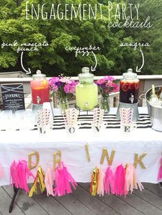 a table with drinks and decorations on it