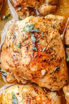 chicken thighs with herbs and spices in a pan