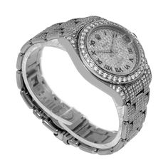 Description Guaranteed Authentic Lady's Rolex Masterpiece with a 34mm 18K white gold case. This fine timepiece features a custom G/VS2 quality brilliant-cut diamond-paved dial with Roman Numerals, a custom G/VS2 quality brilliant-cut diamond bezel, and a 18K White Gold bracelet with custom G/VS2 quality brilliant-cut diamonds. This watch is in excellent condition. It comes with a One Year Warranty from Da Vinci Fine Jewelry, Inc., a gift box and certified retail appraisal from Da Vinci Fine Jewe Luxury Cubic Zirconia Jewelry And Watches For Anniversary, White Gold Diamond Watch With Diamond Accents, Luxury Platinum Diamond Watch With Brilliant Cut, Luxury Diamond Watch With Round Dial For Anniversary, Luxury Watches With Brilliant Cut For Anniversary, Anniversary White Gold Watch With Pave Setting, White Gold Diamond Jewelry With Brilliant Cut, Luxury Cubic Zirconia Watch For Anniversary, Diamond Watch With Brilliant Cut