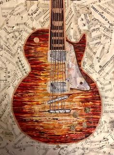 an electric guitar painted on sheet music