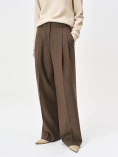 These bestselling pleated wide-leg pants from READYFI combine luxurious 60% wool blend construction with sophisticated tailoring for an effortlessly polished look. The versatile design features classic details including belt loops, diagonal front pockets, and decorative back welt pockets, while the full lining above the knee ensures comfort and structure. Available in brown, charcoal, and black colorways, these pants provide excellent warmth and styling versatility from fall through winter.Color Pants Brown, Winter Color, Wool Pants, Wide Pants, Polished Look, Above The Knee, Welt Pockets, Welt Pocket, Leg Pants