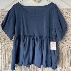 Nwt. Free People Comfy And Cute Peplum Style Shirt. Casual Ruffle Hem Top With Relaxed Fit, Casual Tops With Ruffle Hem And Relaxed Fit, Indigo Crew Neck Tops For Summer, Indigo Tops For Everyday Spring Wear, Cotton Crew Neck Top With Ruffle Hem, Indigo Cotton Tops For Day Out, Indigo Short Sleeve Top For Spring, Blue Short Sleeve Top With Ruffle Hem, Blue Tops With Ruffle Hem And Short Sleeves