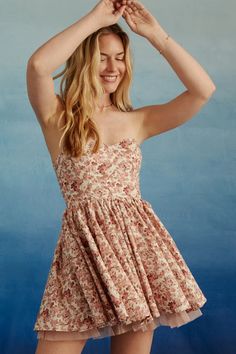 This romantic floral dress boasts a flattering sweetheart neckline and a hidden surprise: a lacy-trimmed petticoat that peeks below the flowing skirt. Flowing Skirt, Romper With Skirt