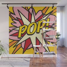 a pop art wall mural in a living room