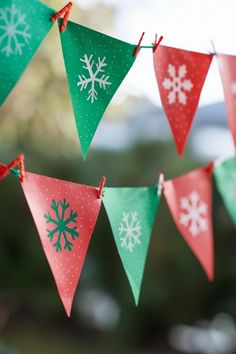 christmas bunting with snowflakes hanging from it