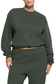 SKIMS Cotton Blend Fleece Crewneck Sweatshirt | Nordstrom Relaxed Fit Solid Top With Ribbed Waistband, Relaxed Fit Top With Ribbed Waistband, Solid Relaxed Fit Top With Ribbed Waistband, Solid Top With Ribbed Waistband And Relaxed Fit, Crew Top With Elastic Cuffs For Loungewear, Crew Tops With Elastic Cuffs For Loungewear, Crew Neck Top With Elastic Cuffs For Loungewear, Basic Long Sleeve Sweatshirt With Ribbed Waistband, Long Sleeve Tops With Ribbed Waistband And Cozy Fit