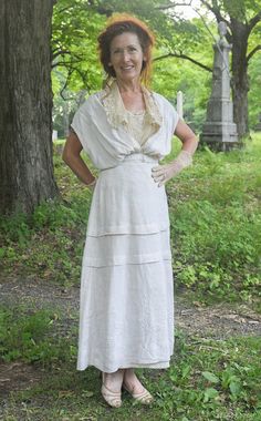 A rare historical fashion find ! Edwardian over dress, made to be worn like a jumper with a high neck blouse underneath. The height of fashion in Edwardian times. Closes with hook and eyes. The only flaws that I notice is some wear around the neckline and a little at the waist band, see photos. Worn by my model Stephanie in my fashion photo shoot. She is wearing a mesh blouse underneath (not included, listed and sold separately). Shown on my mannequin 34 1/2" , 26", 36" As you can see , it fit her well My measurements taken flat Bust 17" plus fullness Waist 12" Hips 19" Bodice about 16" (there isn't any shoulder seams so i estimated where they would be and measured to waist band) Skirt from waist band to edge 33" Historical Design Vintage Dress For Events, Spring Victorian Dress With Historical Design For Costume, Spring Victorian Dress Costume With Historical Design, Spring Victorian Dress Historical Design For Costume, Spring Victorian Costume Dress With Historical Design, Empire Waist Victorian Dress For Garden Party, Daywear Dresses With Historical Design And Fitted Bodice, Vintage Cream Dresses With Historical Design, Cream Victorian Dress With Historical Design