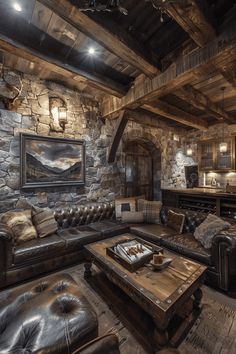 a living room filled with furniture and a stone wall covered in wood planked walls