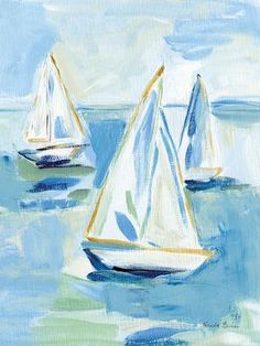 three sailboats floating in the ocean on a sunny day