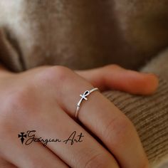 Meaningful mini Ankh ring, also called symbol of life ring. the ankh symbolizes both mortal existence and the afterlife. Wear it separate or stack it with other rings. Order in 10k, 14K or 18K solid gold. Metal choices: 10K solid gold (Yellow, rose or white) 14K solid gold (Yellow, rose or white) 18K solid gold (Yellow, rose or white Choose your desired ring size. Ring width: 5mm ------PRODUCTION TIMELINE------------ Allow, 2-3 weeks for production. Symbolic Ankh Ring As A Gift, Symbolic Ankh Rings For Gifts, Ankh Ring, Ankh Jewelry, Paw Print Necklace, Paw Print Charm, Lovers Necklace, Egyptian Symbols, Life Symbol