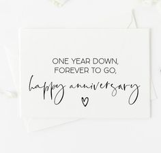 one year down, forever to go, happy anniversary card with black ink on white paper