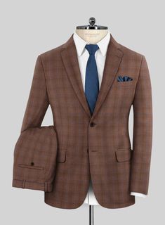 Enhance your appearance with a dash of finesse by wearing our Reda Nutmeg Brown Checks Wool Suit. Made from pure wool fibers, resulting in a beautifully smooth fabric that provides extra warmth during colder seasons. The cool-toned n utmeg  brown color is subtly varied, creating a check design with blue fleece that adds depth to the hue. This suit is an excellent alternative to the usual rotation of gray and navy suits without being too bold. It's perfect for high-class occasions and outings. Tailored Wool Suits For Fall, Fitted Winter Suits For Semi-formal Occasions, Winter Semi-formal Fitted Suit, Fitted Suits For Business Casual In Fall, Fitted Suits For Fall, Fitted Fall Suits In Suiting Fabric, Timeless Fitted Suits For Fall, Timeless Fitted Suit For Fall, Timeless Fitted Fall Suits