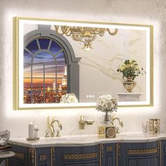 a bathroom vanity with two sinks and a large mirror above it that has a view of the city