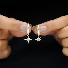 Product Details You can wear it as everyday pieces of jewelry with a casual outfit or just for special nights out. These Starburst Hoop Drop Earrings looks so elegant at New Year Evening. These Earrings are ornamented with Round Cut Peridot Gemstone in 4 Prong Setting, crafted with Solid Gold Metal. Product Information SKU SHP-EARRINGS102110911 Length 26.7 mm Width 9.4 mm Weight 3.49 gm (Approximate) PERIDOT INFORMATION No.of Stones 2 Pieces Total Weight 0.32 Carat (Approximate) Dimension(approx Yellow Gold Star Huggie Earrings, Celestial Style Hoop Earrings For Everyday Wear, Yellow Gold Star Shaped Huggie Earrings, Hoop Huggie Earrings With Star Charm, Hoop Drop Earrings, Peridot Earrings, Peridot Gemstone, Nouvel An, Casual Outfit