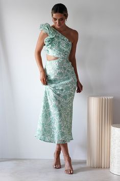 Highlights Stunning one-shoulder ruffle maxi Midriff cut outs Textured Fabric Available in Pink, Green & Blue Prints Fit & Fabric Made from 90% Polyester 10% Spandex Side Zip Length from top of shoulder to hem: 137cm Stretch: 7/10 The model is 5'10 and wears UK size 8 / S / US size 4 If you have a C-cup or above go one size up Perfect for Wedding guest Graduations Christenings and special occasions Blue Prints, Midaxi Dress, C Cup, Green Print, Textured Fabric, Guest Dresses, Cut Outs, Wedding Guest Dress, Green Dress