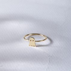 Tiny Ghost Ring, 14K 18K Real Solid Gold Ring, Minimalist Cute Spooky Halloween Ring, Personalizable Specter Ring, Halloween Gift  This ring is made to accompany you to your Halloween party👻 👻 DETAILS: - Gold Material: Solid Gold (no gold-filled or no gold plated material) - Gold Karat: 14K (%58,5), or 18K(%75) - Available gold color: Yellow Gold, Rose Gold, and White Gold 👻DIMENSIONS Ghost Height: 7.60 mm (0.29 inch) Ghost Width: 6.30 mm (0.24 inch) This is a handmade product so dimensions may vary. ✈️ SHIPMENT After your confirmation, I will ship your order in 1-3 business days. Estimated delivery time for UPS Express 3-4 business days. Please check your messages after your order for confirmation.  More for Initial & Name Ring  https://etsy.me/3rU1ccc Halloween Rings, Ghost Ring, Tiny Ghost, Fall Gift Baskets, Halloween Ring, Yellow Gifts, Halloween Lovers, Name Rings, Solid Gold Ring