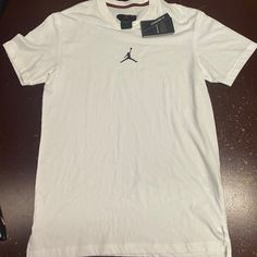 Nike Mens White Air Jordan Dri Fit Da2694-100 Pullover T Shirt Size S M L Xxl Brand: Nike Department: Men Size: S, M, L, Xxl Color: White Type: T Shirt Style: Pullover Pattern: Solid Theme: Classic Neckline: Crew Neck Occasion: Casual Season: All Season Features: Comfort, Breathable Sleeve Length: Short Sleeve Condition: New With Tag I Offer Discounts For All Return Customers. - Jvs Classic White Sports T-shirt, Classic Crew Neck Sports Top, Nike Cotton Crew Neck Shirt, Sporty White Crew Neck Shirt, White Sporty Crew Neck Shirt, Nike Casual Crew Neck Shirt, Casual Nike Crew Neck Shirt, Classic White Nike Tops, Casual Sports Polo Shirt