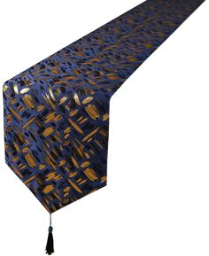 a blue tie with gold and black designs hanging from it's end, on a white background