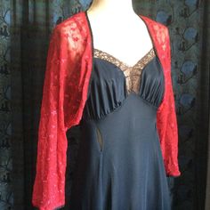 These little bolero shrugs are ideal as a shrugs for dresses. They can also dress up a casual jeans look.  Made of a stretch lace or nylon mesh.  The dolman sleeves are 3/4 length.  The edges are all finished with a black stretch ruffle trim, or in the case of the red with white floral, white stretch piping.  One size fits most, probably up to a size 16. NOW 50% OFF PLUS FREE SHIPPING Spring Party Shrug With Lace Trim, Fitted Open Front Shrug For Party, Spring Fitted Shrug With Lace Trim, Fitted 3/4 Sleeve Party Shrug, Fitted Party Shrug With Lace Trim, Fitted Shrug With Lace Sleeves For Spring, Fitted Lace Trim Shrug For Party, Fitted Lace Trim Party Shrug, Fitted 3/4 Sleeve Shrug For Fall