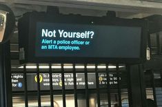 a sign that says not yourself? alert a police officer or an mta employee