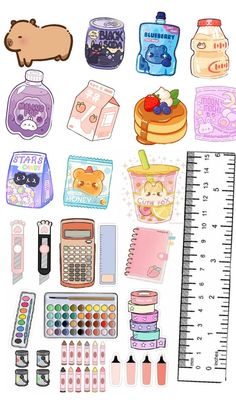 various stickers are arranged on top of a ruler