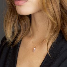 Elegant, feminine, unexpected. The Pila pendant is constructed of solid 14k recycled gold and hung on a sparkling diamond-cut solid gold chain. We love the way the luminescent pearls sit together, exuding an elegance that is at once delicate and bold. ♦︎ Made to Order ♦︎ 8 and 5.5mm freshwater pearls ♦︎18" long, lobster clasp closure ♦︎ 14k Recycled Gold Delicate Pink Pearl Pendant Jewelry, Delicate Pink Pearl Pendant Necklace, Feminine Pink Necklace With Pearl Pendant, Elegant Pink 14k Gold-filled Necklace, Elegant 14k Gold-filled Pearl Necklace With Charm, Solid Gold Chains, Recycled Gold, Pearl Color, Ear Jewelry