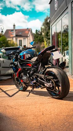 a motorcycle parked in front of a building