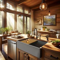 a kitchen with wooden walls and flooring has a large window that looks out onto the woods