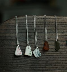 !! PLEASE NOTE THAT THE PENDANTS ARE ONLY EXAMPLES OF THE EXACT ONES THAT YOU WILL RECEIVE AS THERE IS NO TWO IDENTICAL PIECE OF SEA GLASS OUT THERE. ONCE YOU ORDER, I WILL GET IN TOUCH AND SEND YOU MULTIPLE OPTIONS OF PENDANTS IN THE STYLE AND COLOUR CHOSEN BY YOU. THANK YOU FOR YOUR UNDERSTANDING!  Sea glass/ Sea Pottery necklace handmade with love in Aberdeen, Scotland. The chain is a high-quality sterling silver chain 100% made of recycled silver. The sea glasses and potteries used as pendan Pottery Necklace, Aberdeen Scotland, Sea Pottery, Blue Sea Glass, Sea Glass Necklace, Necklace Blue, Recycled Silver, Aberdeen, Glass Necklace