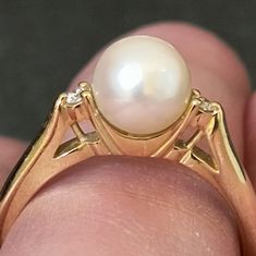 14k Yellow Gold And Diamond Cultured Pearl Ring. In Good Condition. Please See The Pictures Above. Cabochon Pearl Ring In Yellow Gold For Gift, Yellow Gold Cabochon Pearl Ring For Gift, Mikimoto Pearls Ring, Luxury Hallmarked 14k Gold Pearl Ring, Luxury Hallmarked Yellow Gold Pearl Ring, Mikimoto Jewelry, Cultured Pearl Ring, Pearl Ring, Cultured Pearls