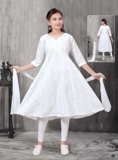 Chikankari top with half lining /pants/Salwar with dupatta. To see entire collection in our shop please visit us : https://www.etsy.com/shop/EthnicPehnava * Type - Kurti & Palazzo/ Pant/ Leggings * Fabric -Cotton * Sleeves - Lining in top * Sleeves - 3/4 th sleeves (Attached to dress) * Neck - Round * Salwar Length - Palazzo / Elastic in waistband * Fit - Regular straight fit Items included in Package * 1 Kurti, 1 Pant, Dupatta Cotton Anarkali Salwar Kameez Fitted, White Cotton Churidar With Chikankari Embroidery, White Cotton Churidar For Diwali, Cotton Anarkali Dress With Lace Work, White Bollywood Style Cotton Churidar, White Bollywood Cotton Churidar, Fitted Cotton Anarkali Lawn Suit, White Cotton Salwar Kameez With Pallu, Fitted White Mulmul Anarkali Set