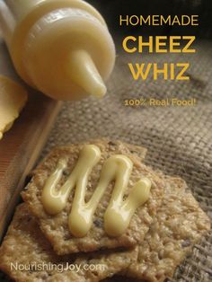 homemade cheez whiz crackers are being drizzled on