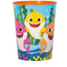 a cup with an image of two sharks on it