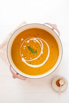 a bowl of soup on a white table