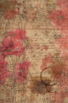 an old paper with flowers on it and writing in the middle, as well as a ring