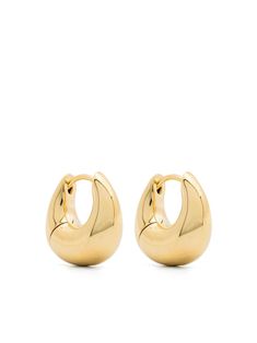 Find TOM WOOD Small Bao Hoop Earrings on Editorialist. gold-tone recycled sterling silver sculpted hoop design polished finish clasp fastening for pierced ears These earrings come as a pair. This item is made from at least 50% recycled or upcycled materials. For recycled synthetic clothing products, we highly recommend using a microfibre-catching washing bag to ensure that no microplastics that can pollute water are released in the process. We've partnered with Good On You — an independent agency that rates how brands perform in relation to their impact on the planet, people and animals, with a multi-criteria rating simplified to a five points scale. In order to be awarded our conscious label, larger brands need to score a minimum of four out of five ('Good'), while smaller brands must sco Tom Wood, Creative Jewelry Photography, Aviator Watch, Planet People, Office Bag, Upcycled Materials, Special Occasion Outfits, Fine Watches